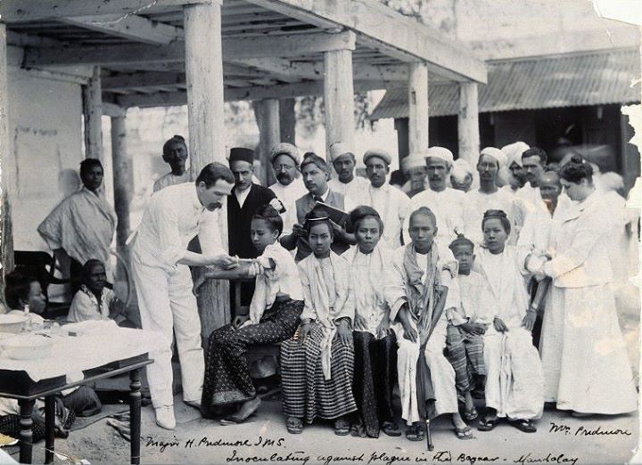 People in Mandalay being 'vaccinated' against the plague by a British physician in the early 1900s