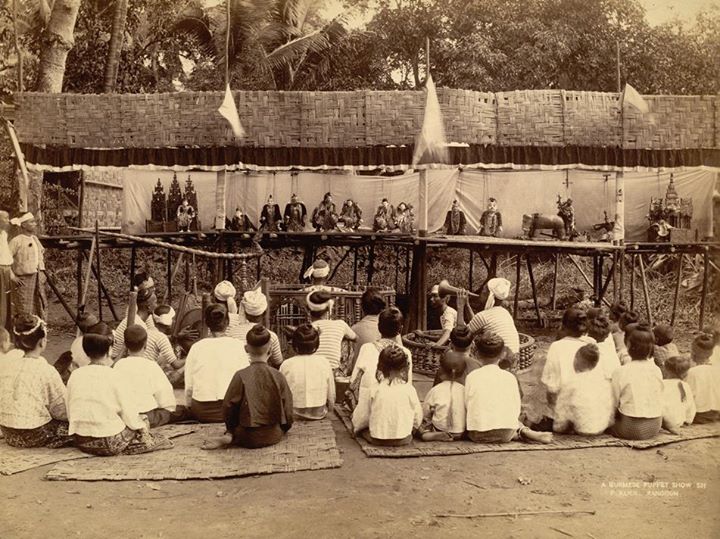 Before TV and the internet: kids (and others) watching a puppet show in Rangoon 1895.